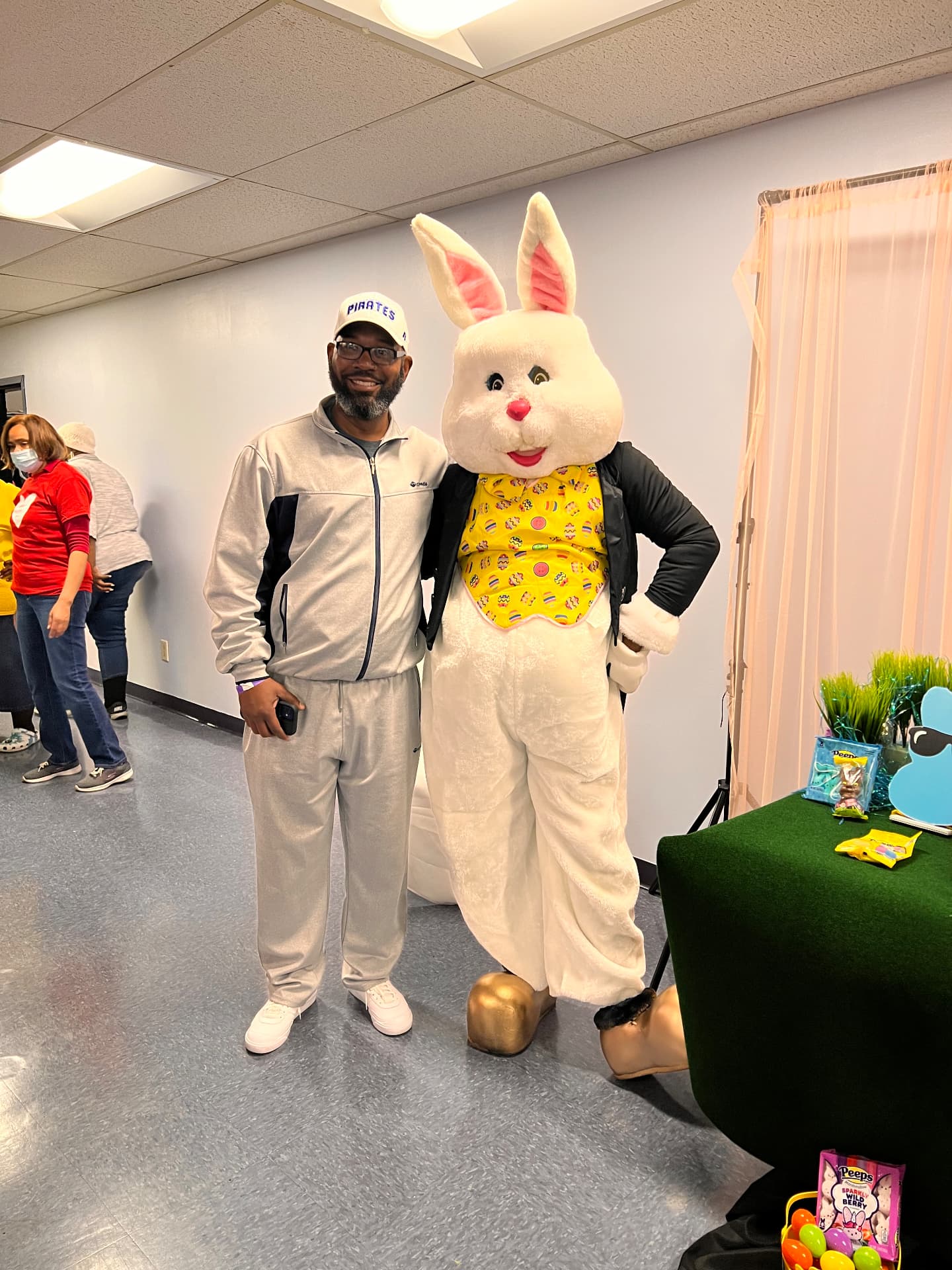 Spring Easter celebration with a pastel drape and treat table — Guest Experience Enhancements by Good Time Mascots in Columbus, Ohio