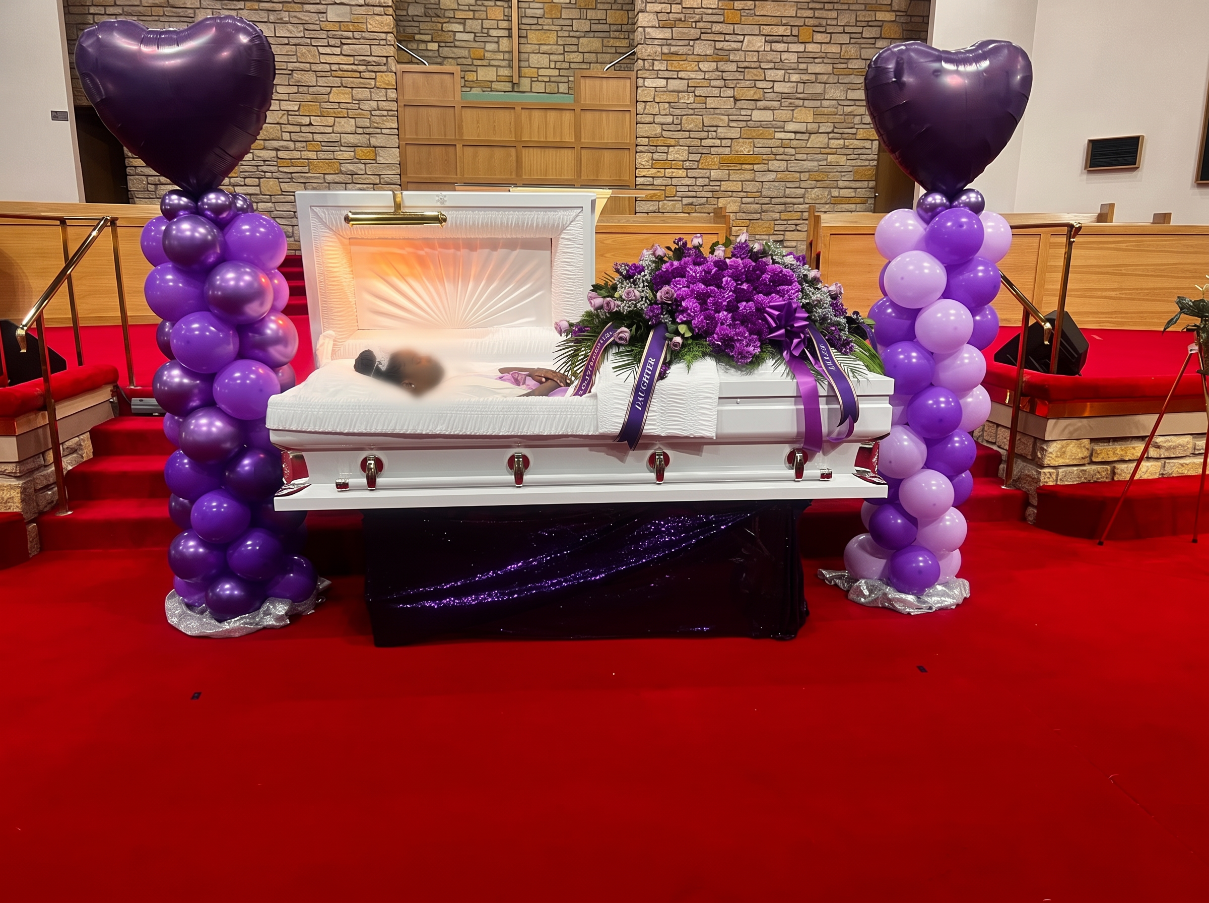 Lavender and purple balloon columns with heart toppers and a white casket spray — Celebration of Life & Memorials by Good Time Mascots in Columbus, Ohio