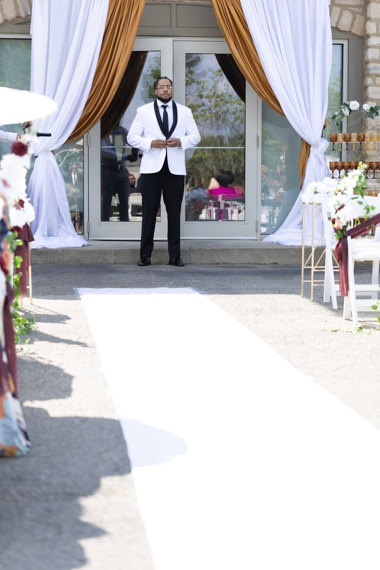 Groom waiting at the head of a white-runner aisle — Weddings by Good Time Mascots in Columbus, Ohio